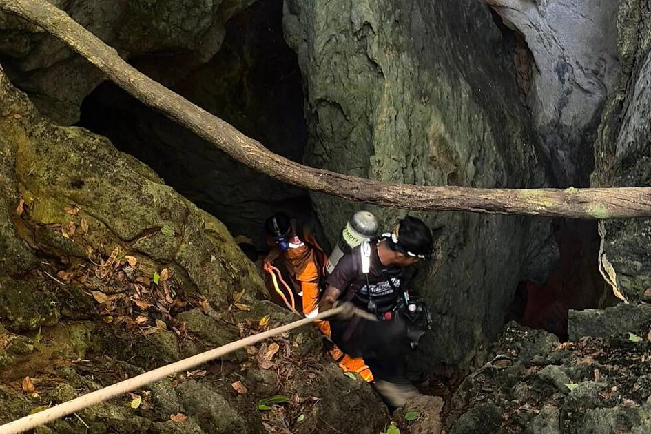 Four Rescued from Flooded Laotian Cave, Search Continues for Two