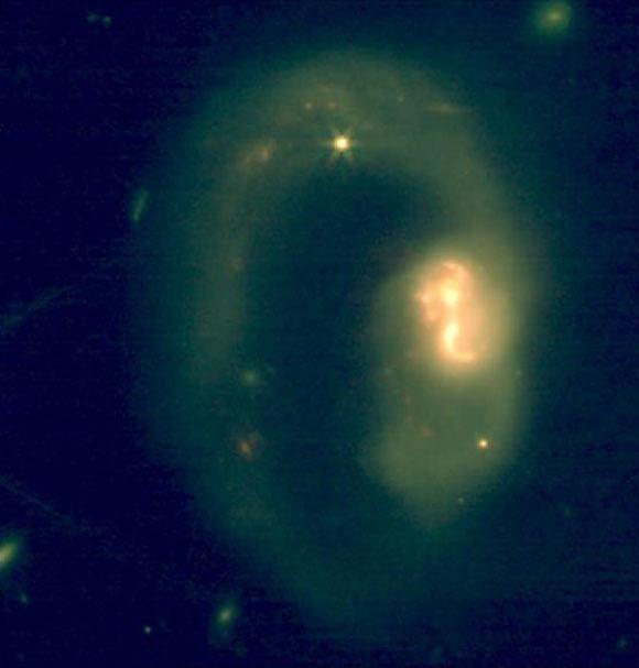 Webb Telescope Uncovers Abundant Hydrocarbons in Distant Galaxy's Core