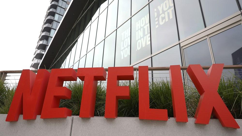 Netflix posts Q3 profit, cuts 1,000 jobs, trims ad revenue forecast