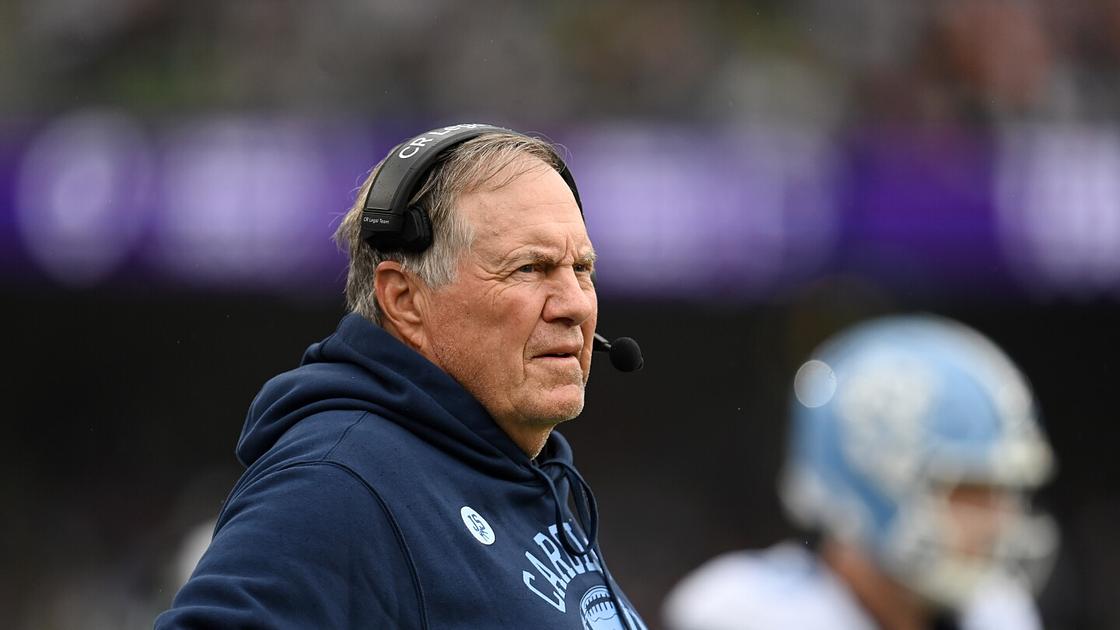 UNC football coach says program complies as investigation widens