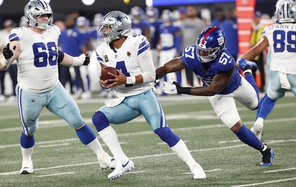 Giants rout Cowboys 28-20 in penalty-laden season opener