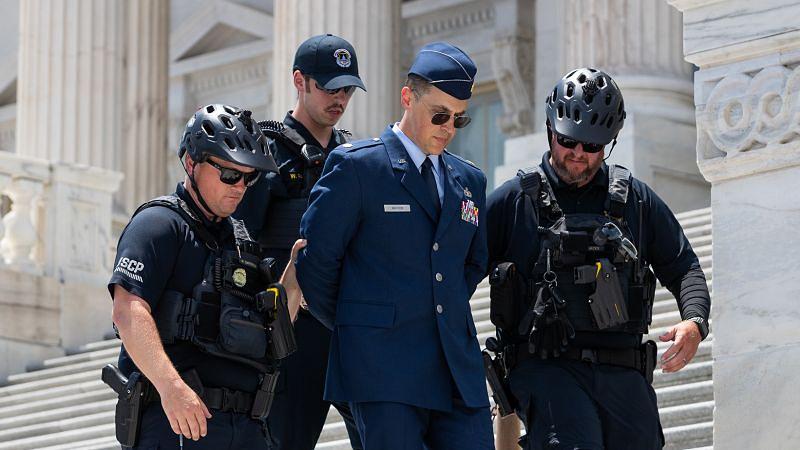 Air Force Major Arrested on Capitol Steps for Impeachment Speech