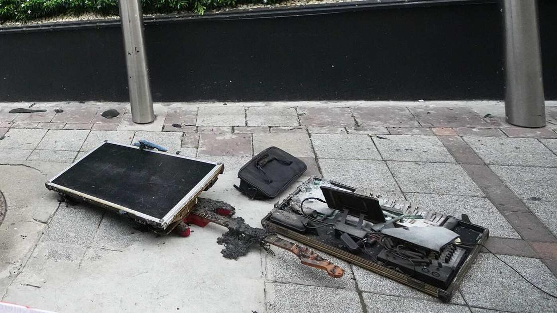 Flash fire at Bangkok bar kills 33, including four band members