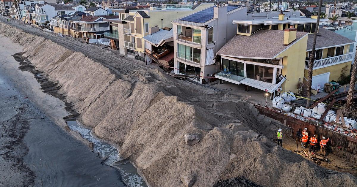 Record king tide floods homes and Pacific Coast Highway in Southern California
