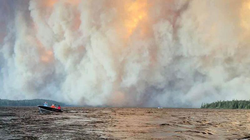 Ontario wildfires force train halts and Indigenous community evacuation