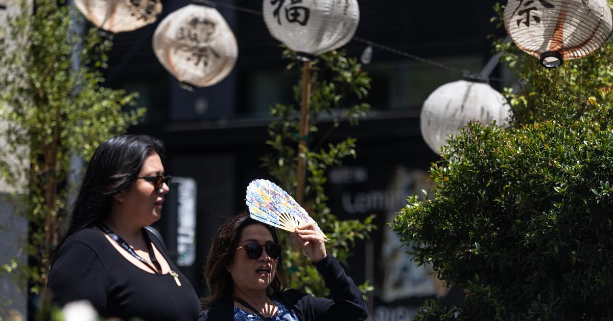 Western U.S. heat wave shatters records and sparks wildfire evacuations